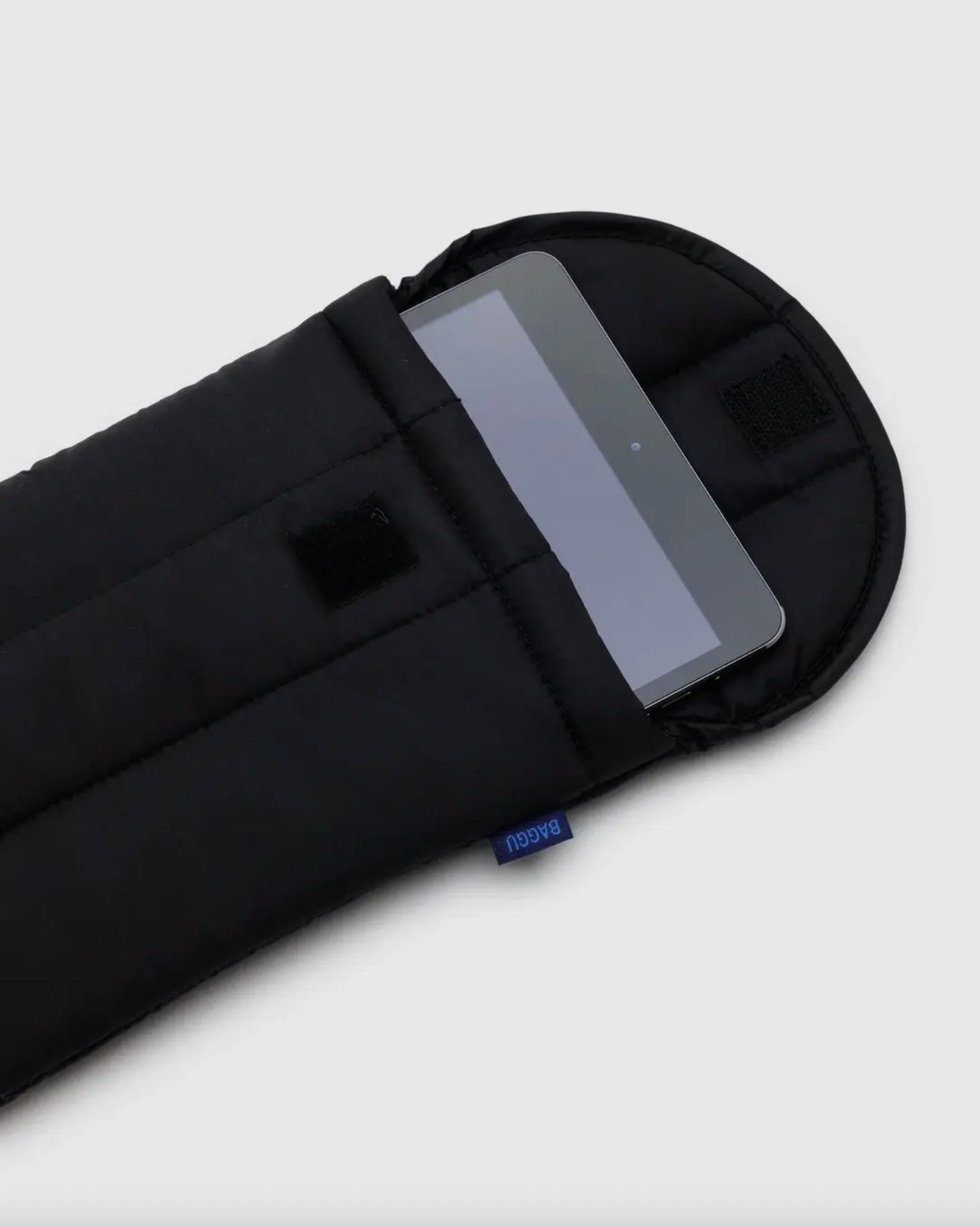 Black 8-inch tablet sleeve with tablet inside and stitched corner patch