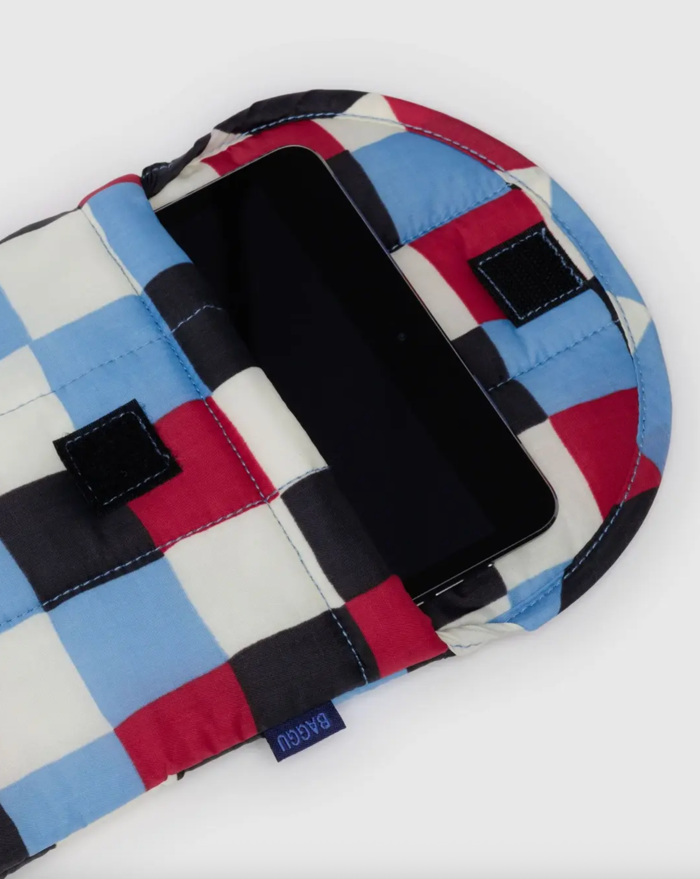 Plaid 8-inch tablet sleeve with tablet inside and black corner tabs