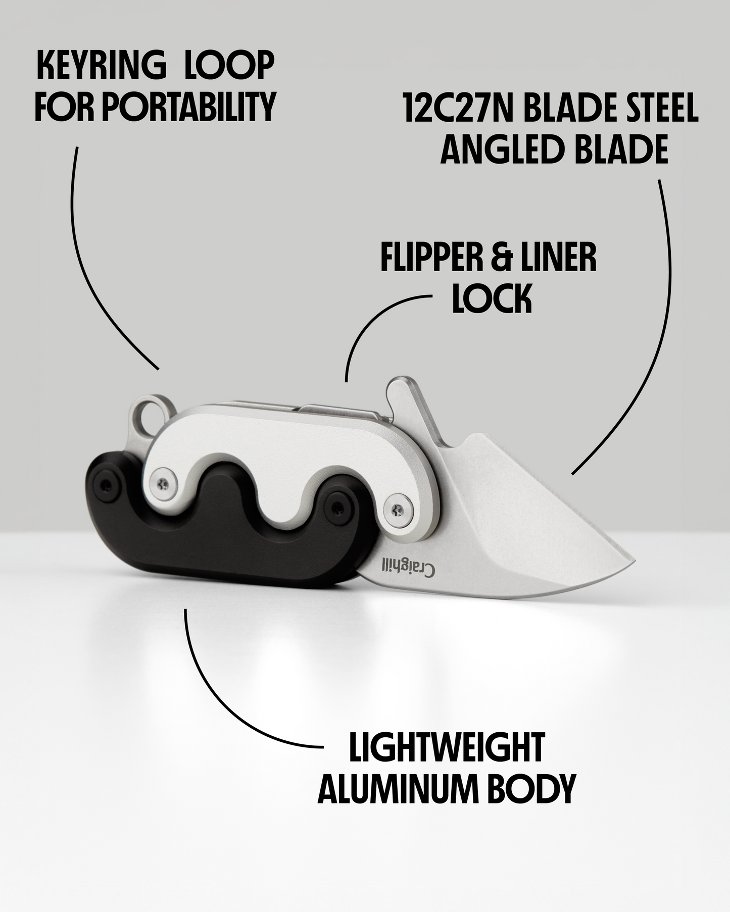 Mini folding knife with keyring loop, flipper/liner lock, angled blade open