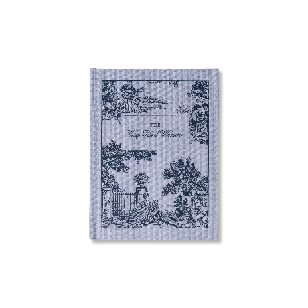 Blue illustrated notepad with central title text on vintage-style cover