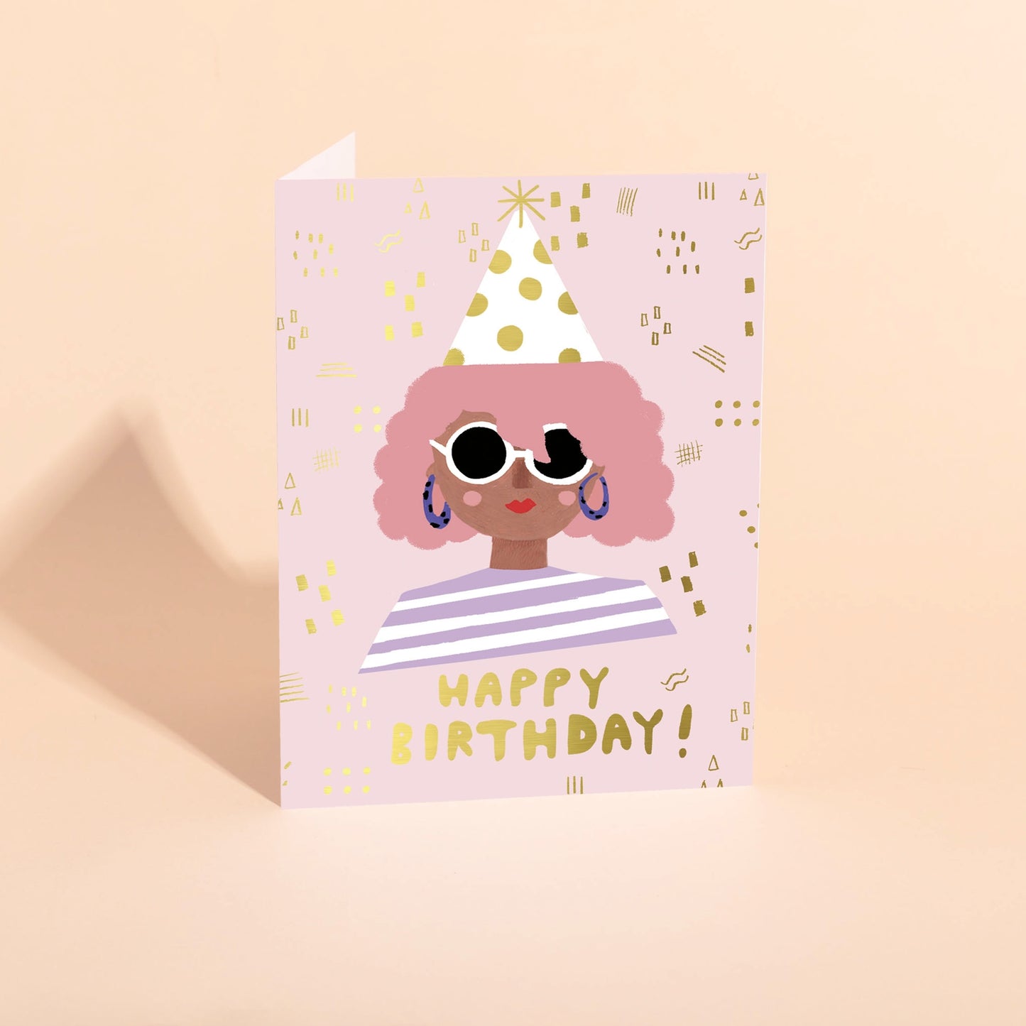 Birthday card with smiling girl in sunglasses, pink curly hair, and “Happy Birthday!” text