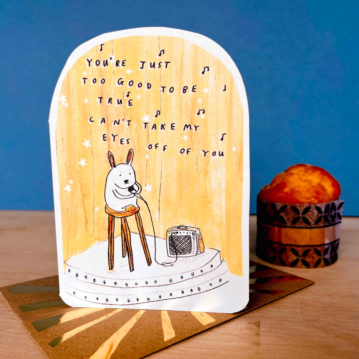 Bunny greeting card with white rabbit on stage and microphone illustration