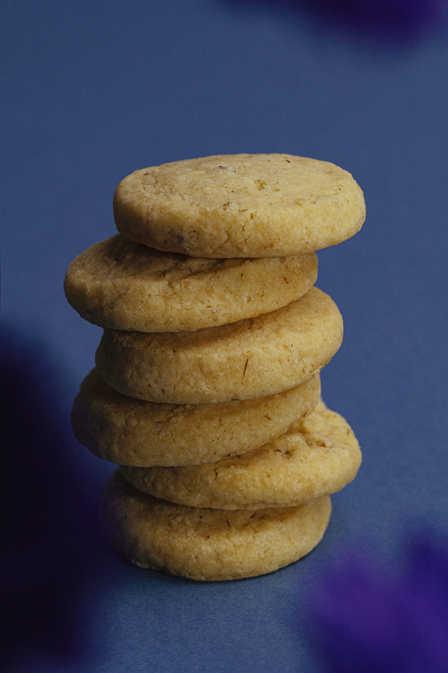 Stack of golden shortbread butter cookies, round
