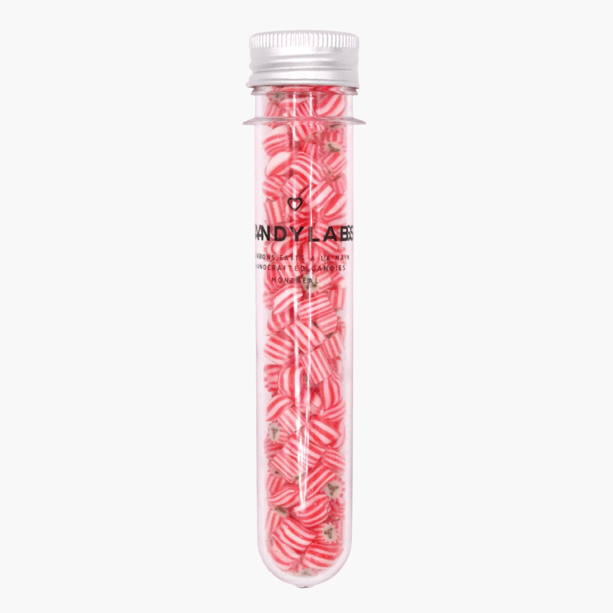 Clear candy tube filled with red-and-white peppermint twists