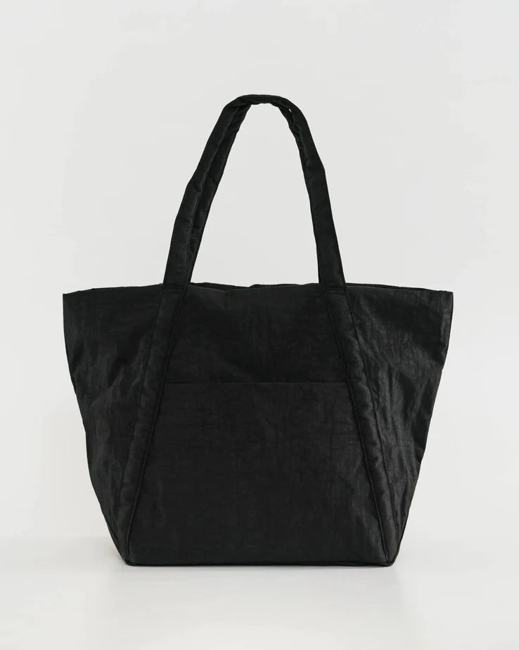 Cloud bag tote in black with two top handles and a wide open main compartment.