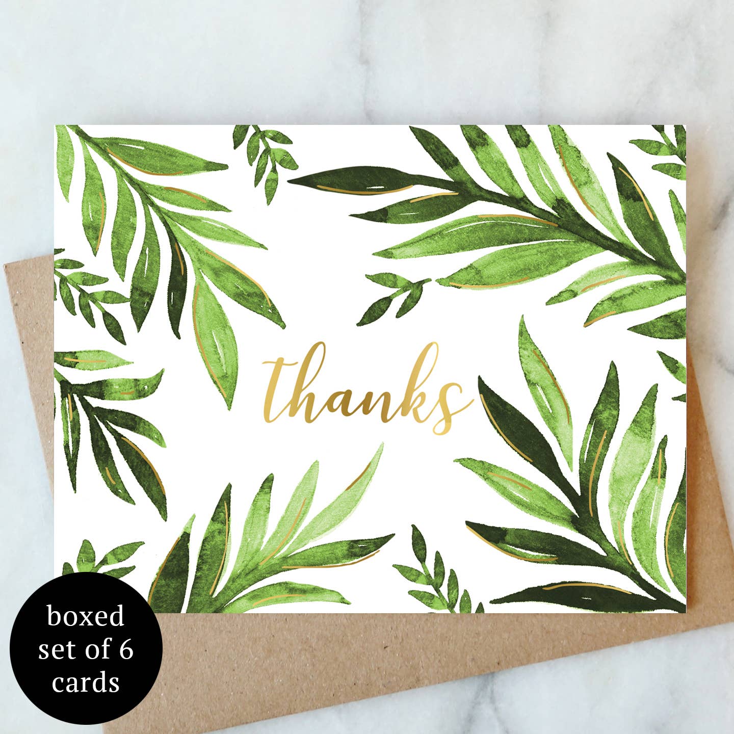 Leaf thank-you greeting card with green foliage and gold 'thanks' script