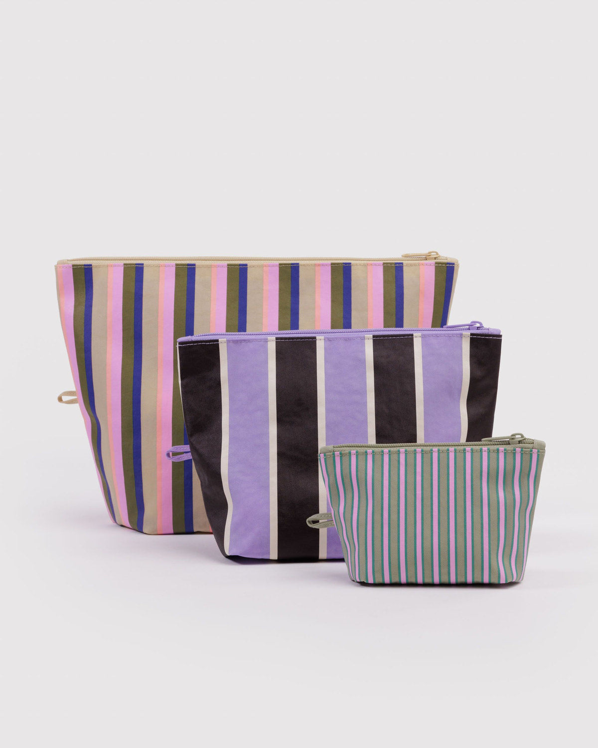 Go pouch set of three fabric zip pouches with striped purple, black, and multicolor panels