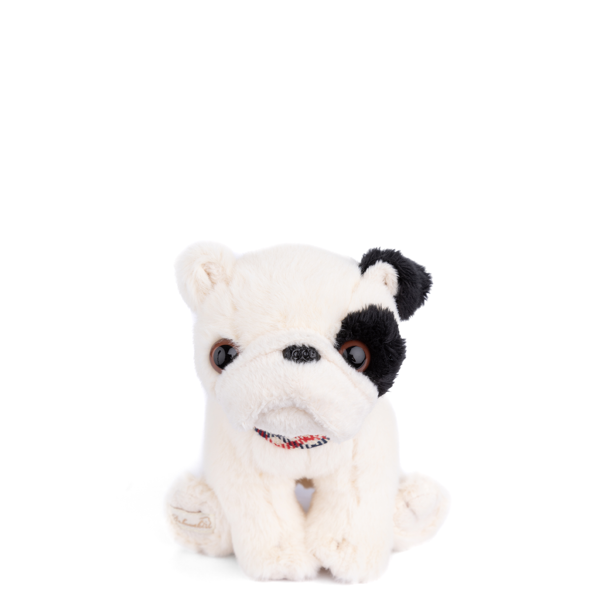 White and black plush pug toy with red-and-blue bandana and stitched face