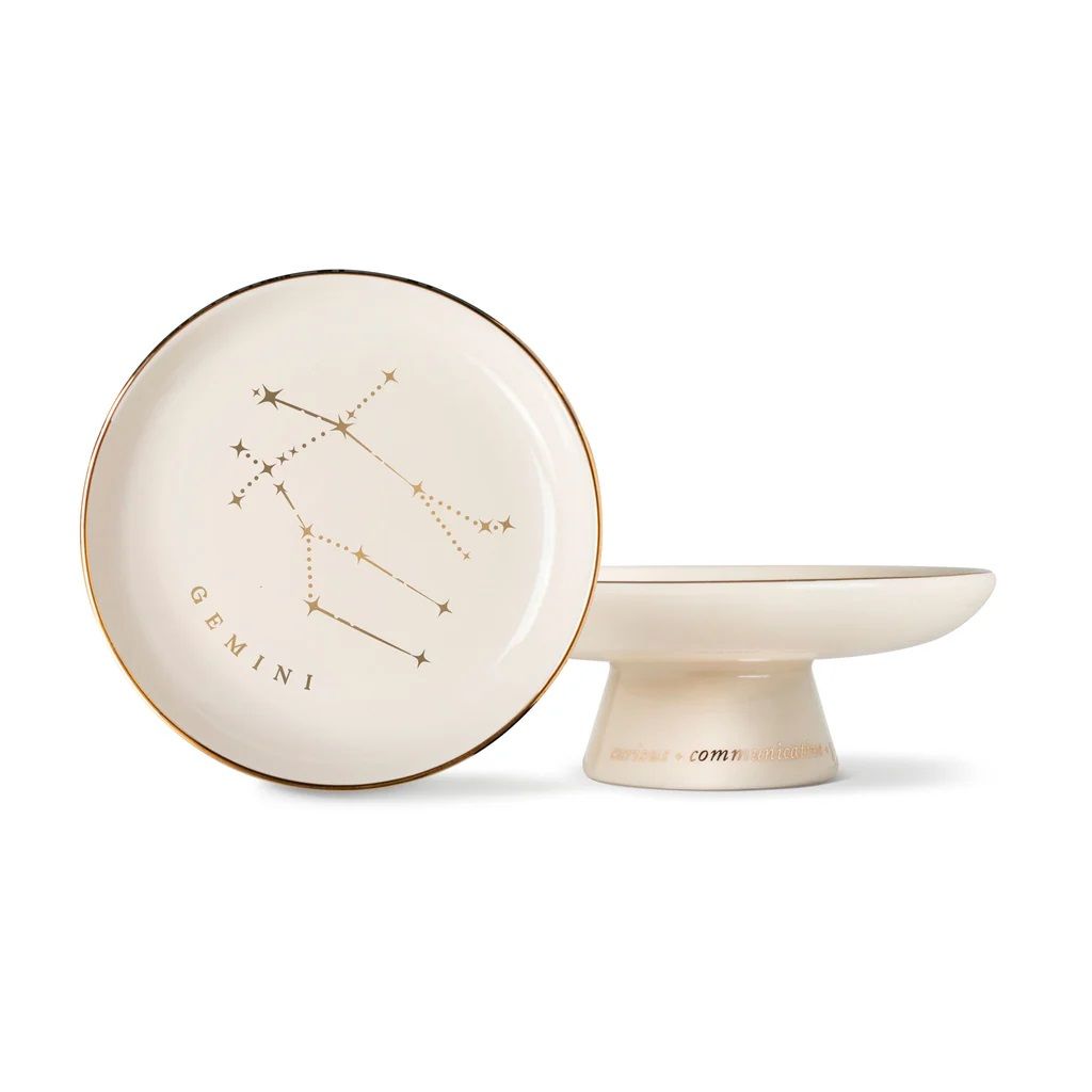 Gemini starry pedestal tray with round white dish, gold rim, constellation print