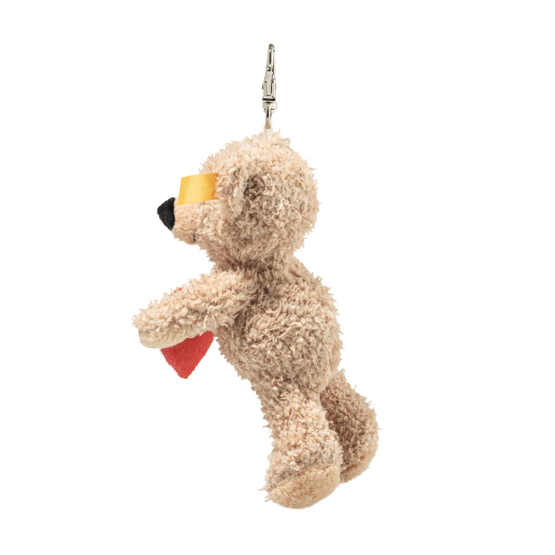 Teddy bear keyring with beige plush fur, red heart on front, metal clasp