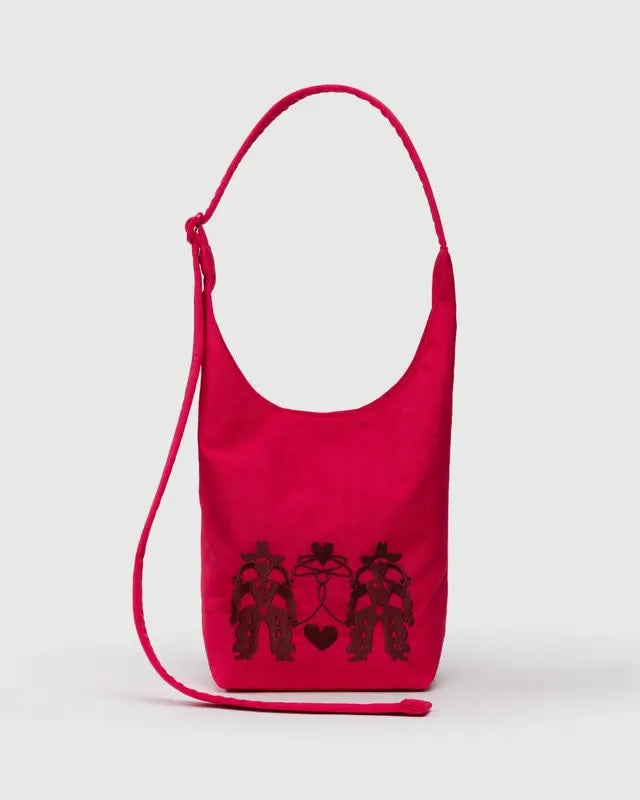 Small nylon sling bag, red with embroidered cowgirl motifs and heart on front