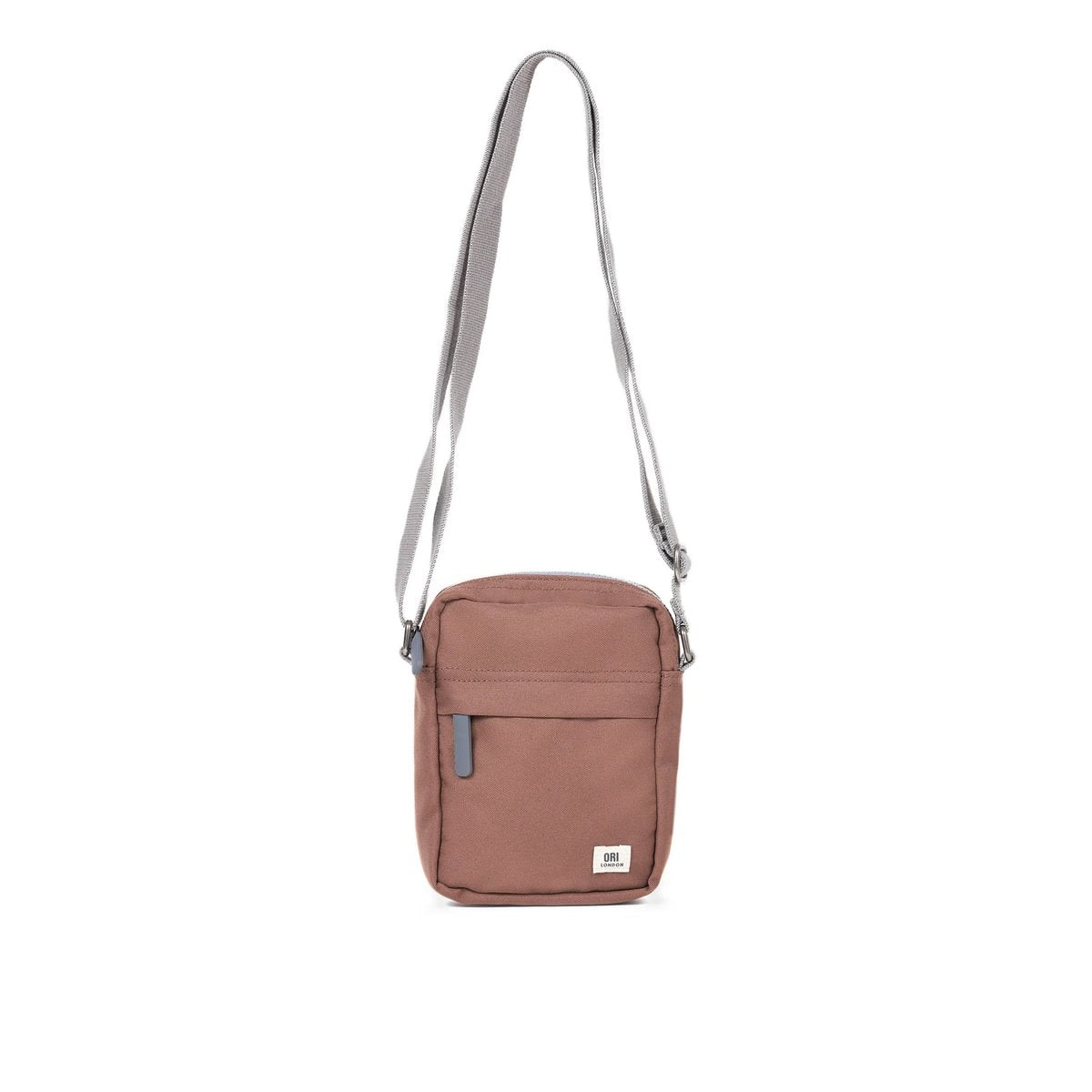 Brown canvas crossbody bag with zip top, small front pocket, and adjustable strap