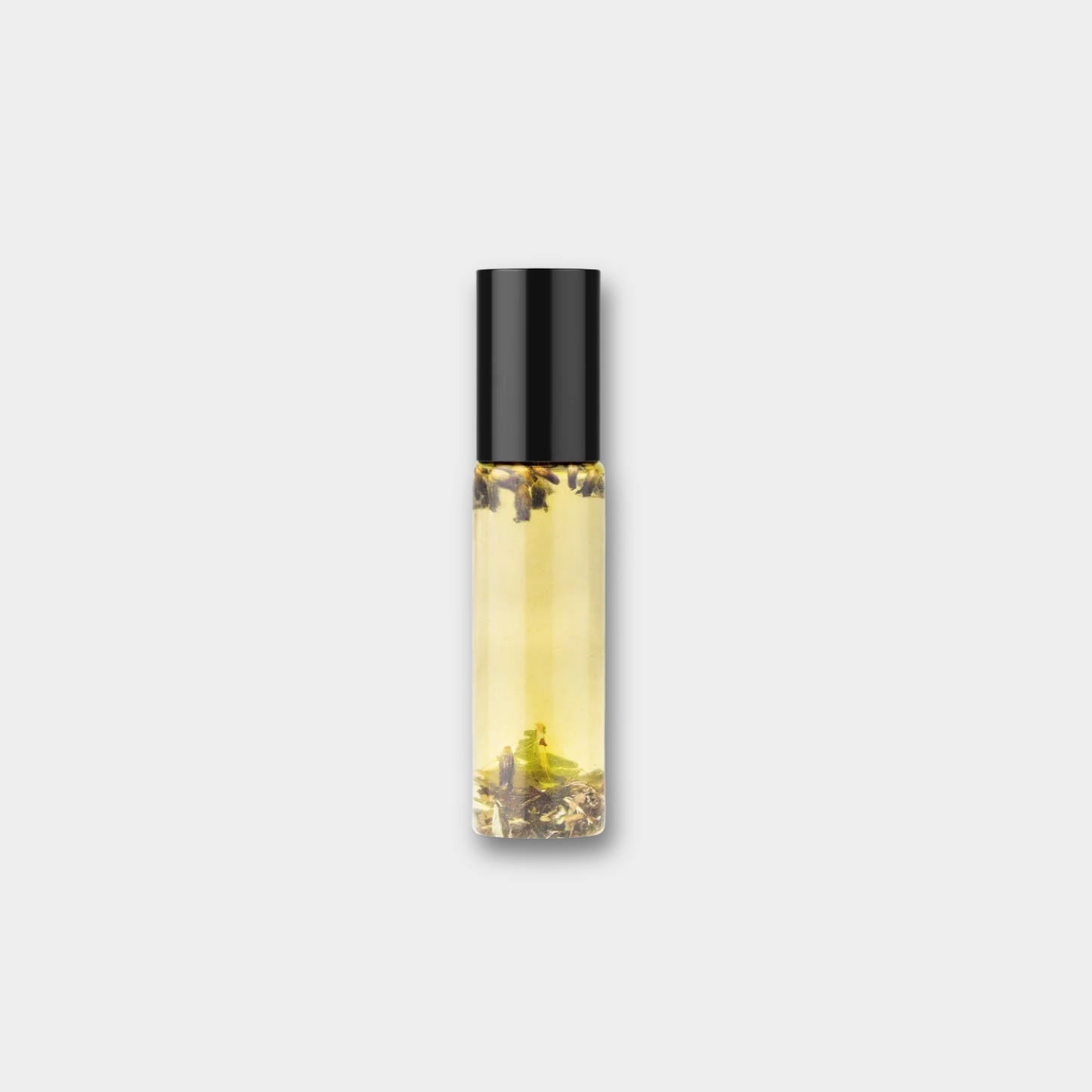 CBD roll-on oil bottle with black cap, clear golden liquid and gold-toned label