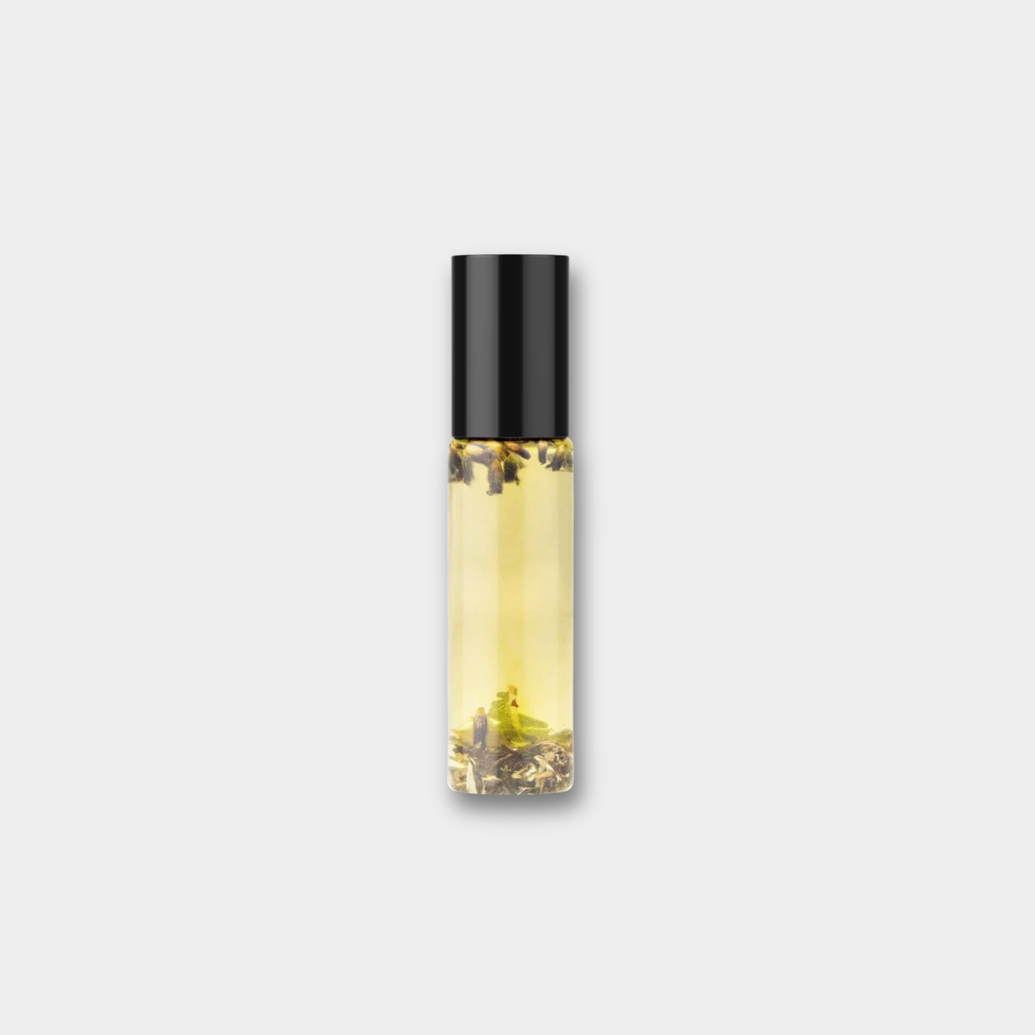 CBD roll-on oil bottle with black cap, clear golden liquid and gold-toned label