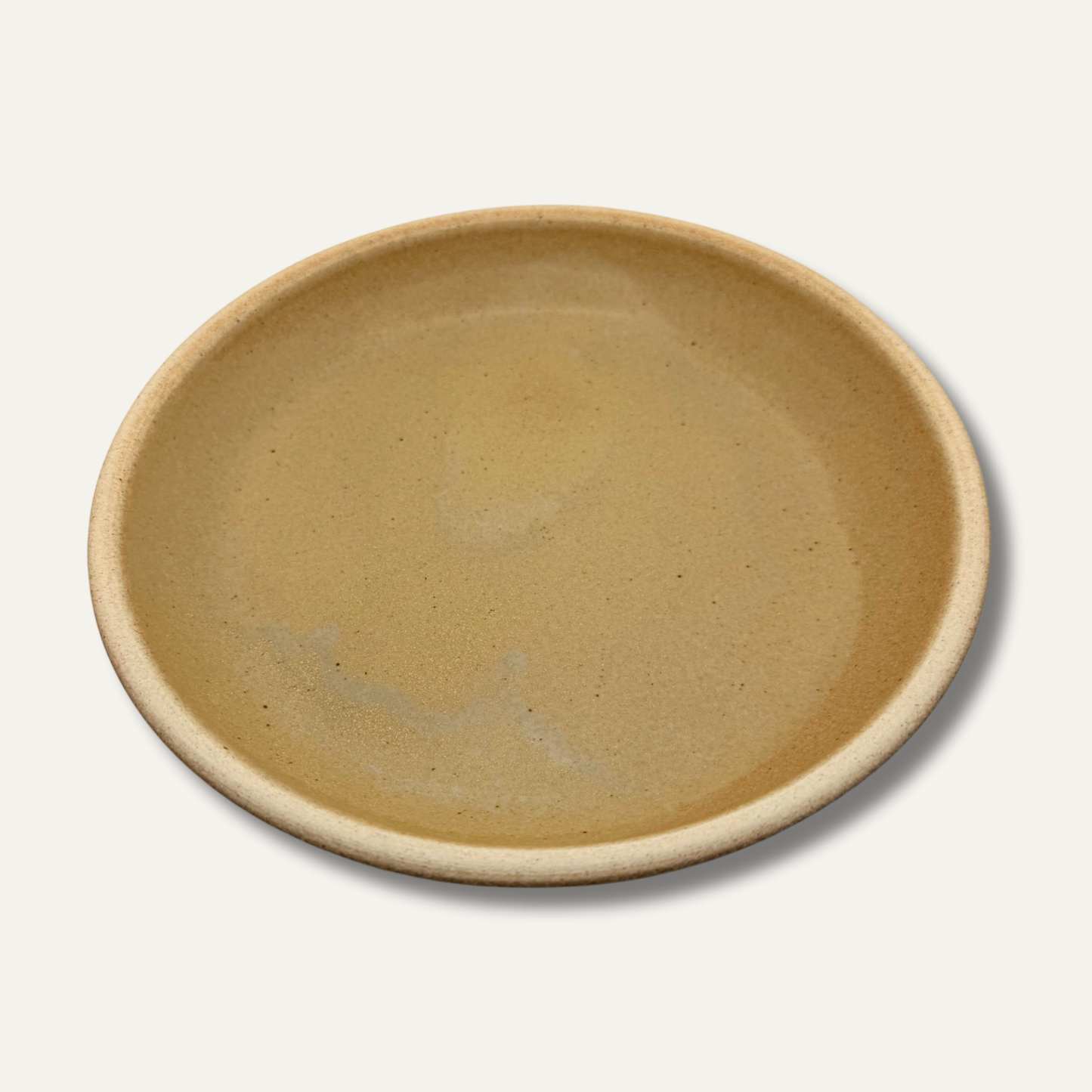 Matte glazed deep dish plate, maize yellow, 8.5 in, close-up top view