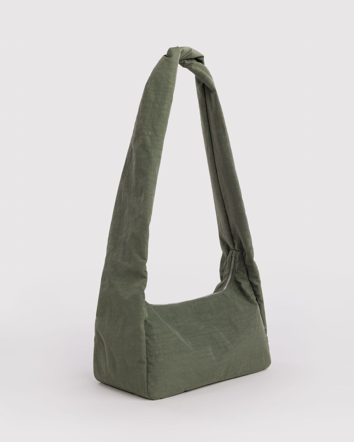 Olive green nylon shoulder bag, folded slouchy silhouette with single top handle.