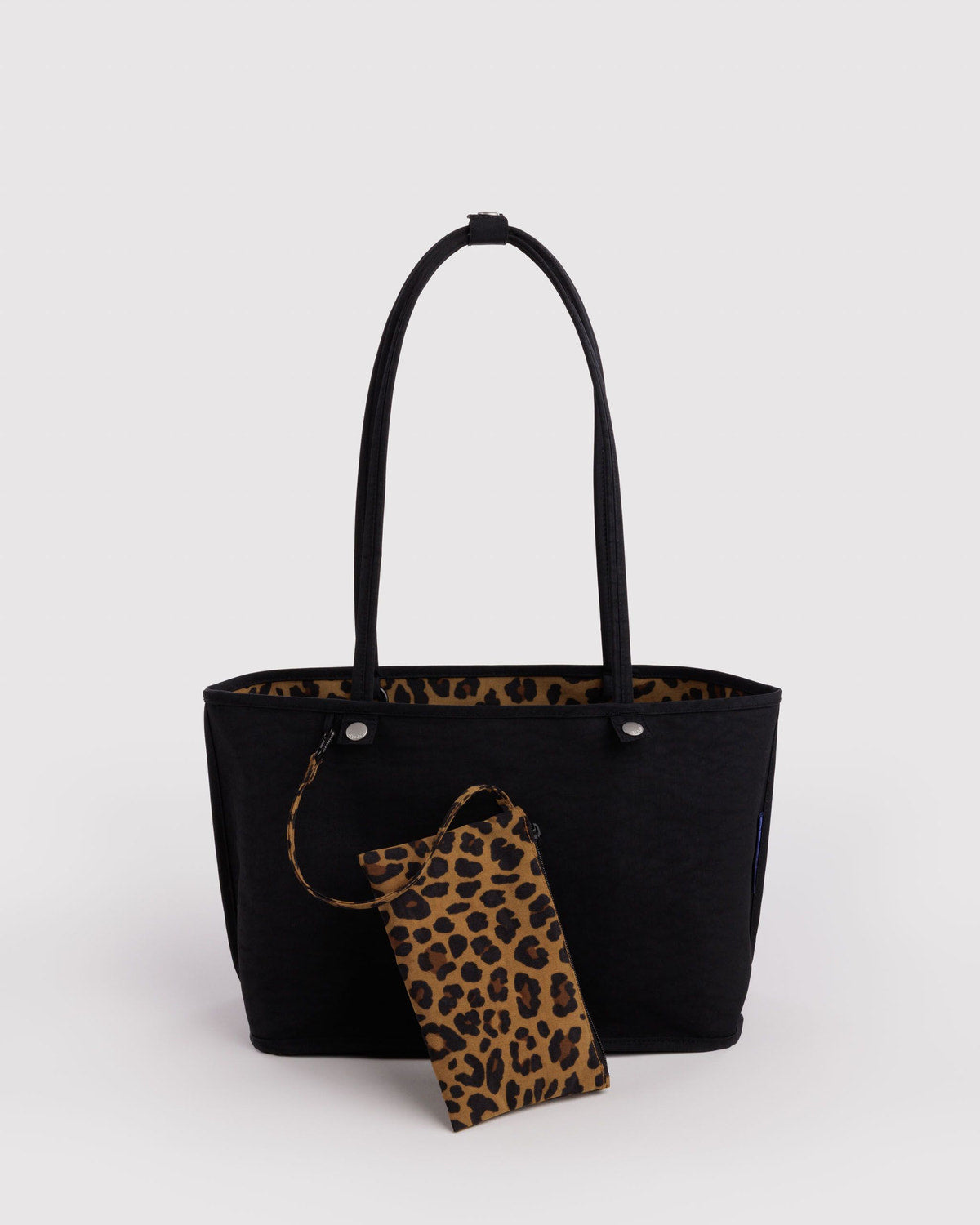Medium nylon reversible tote, black side with leopard print pouch accessory