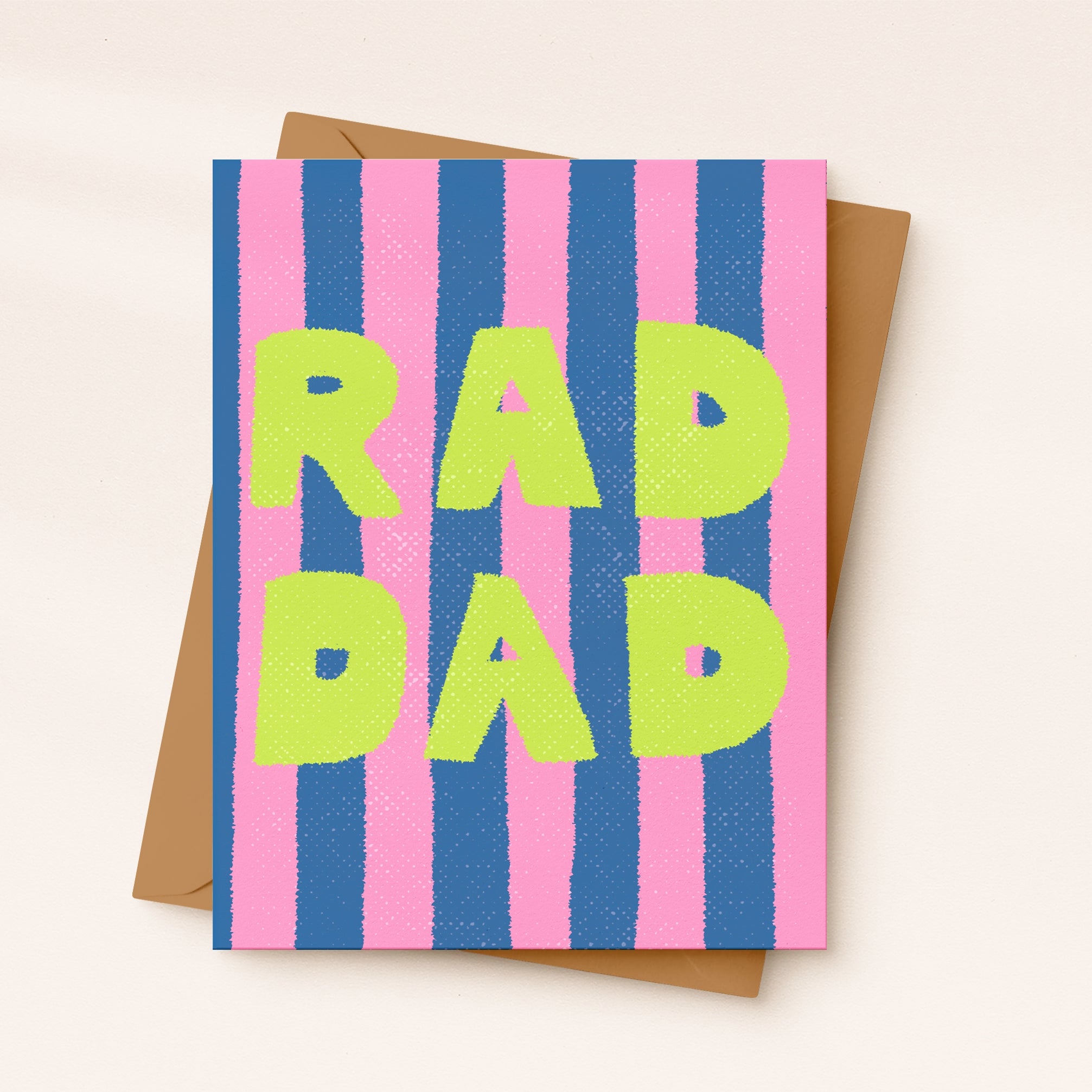 Greeting card with multicolor vertical stripes and large green 'RAD DAD' text