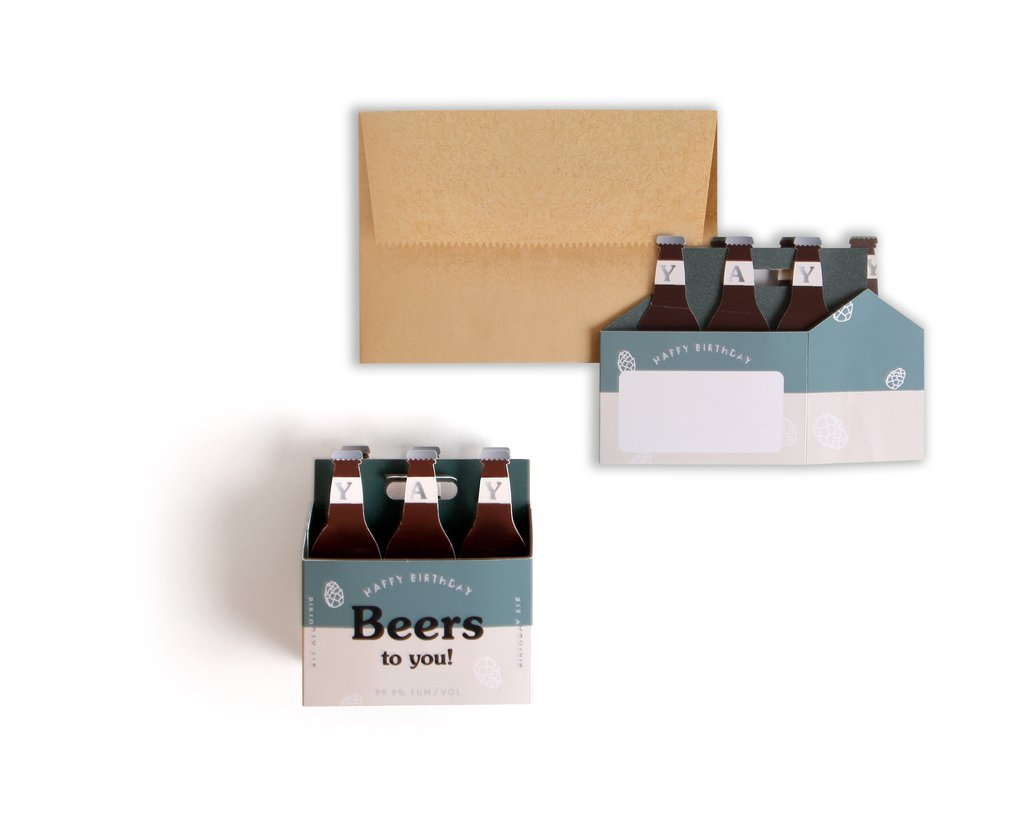Pop-up birthday card with kraft envelope, beer-bottle pop-up and gift box-style base
