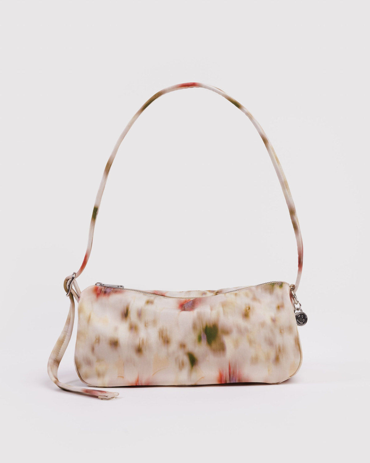 Pastel floral nylon loaf bag with curved top handle and side zipper pocket