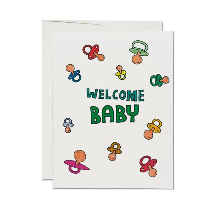 Baby greeting card with pacifier icons and Welcome Baby text