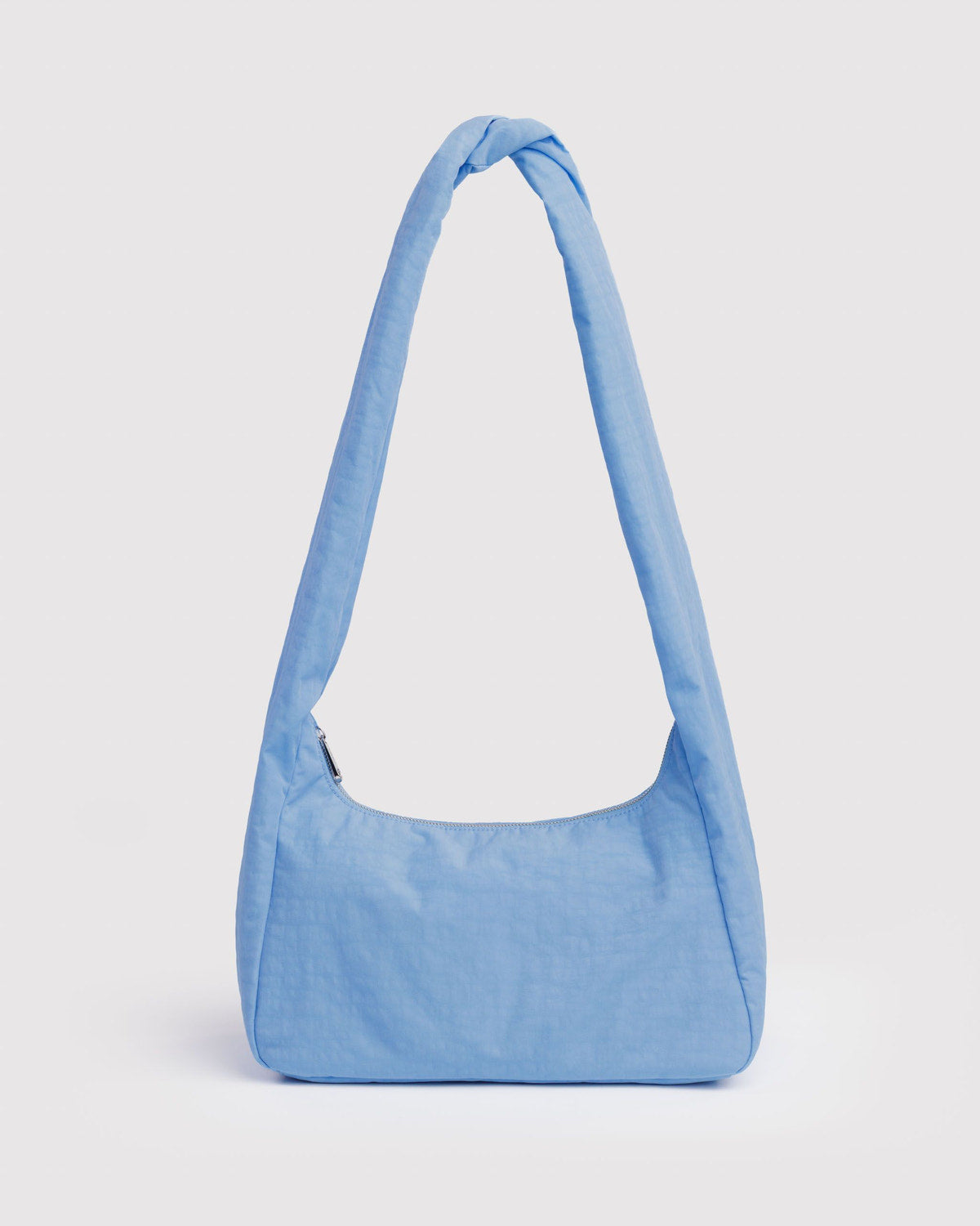Nylon shoulder bag in light blue, slouchy with single top handle.