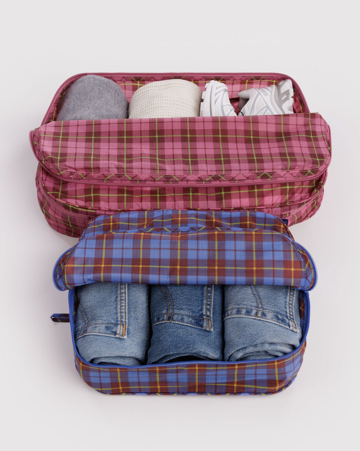 Large packing cubes set with plaid fabric, zip tops, open storage with clothing