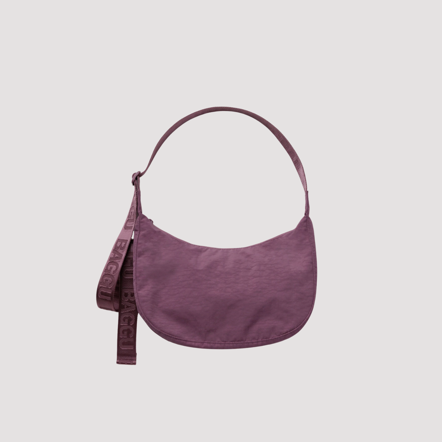 Medium nylon crescent bag in plum purple with top handle and side zipper