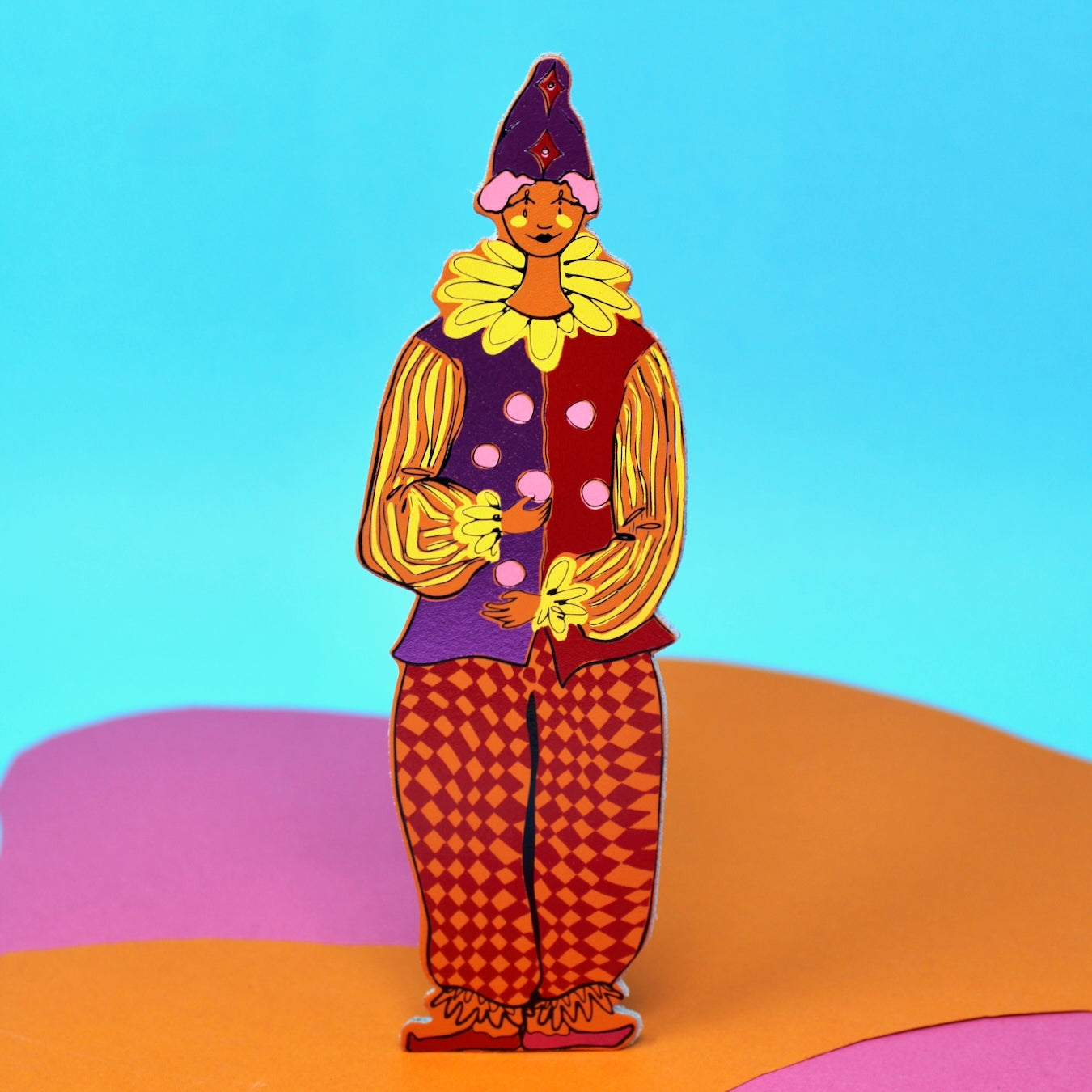 Clown-shaped leather bookmark with orange jester outfit, striped sleeves and polka-dot vest