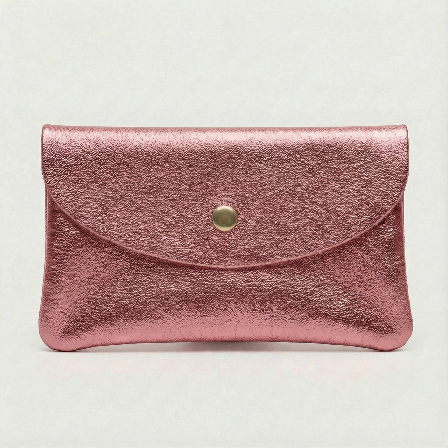 Metallic pink leather wallet clutch with curved flap and small round snap closure