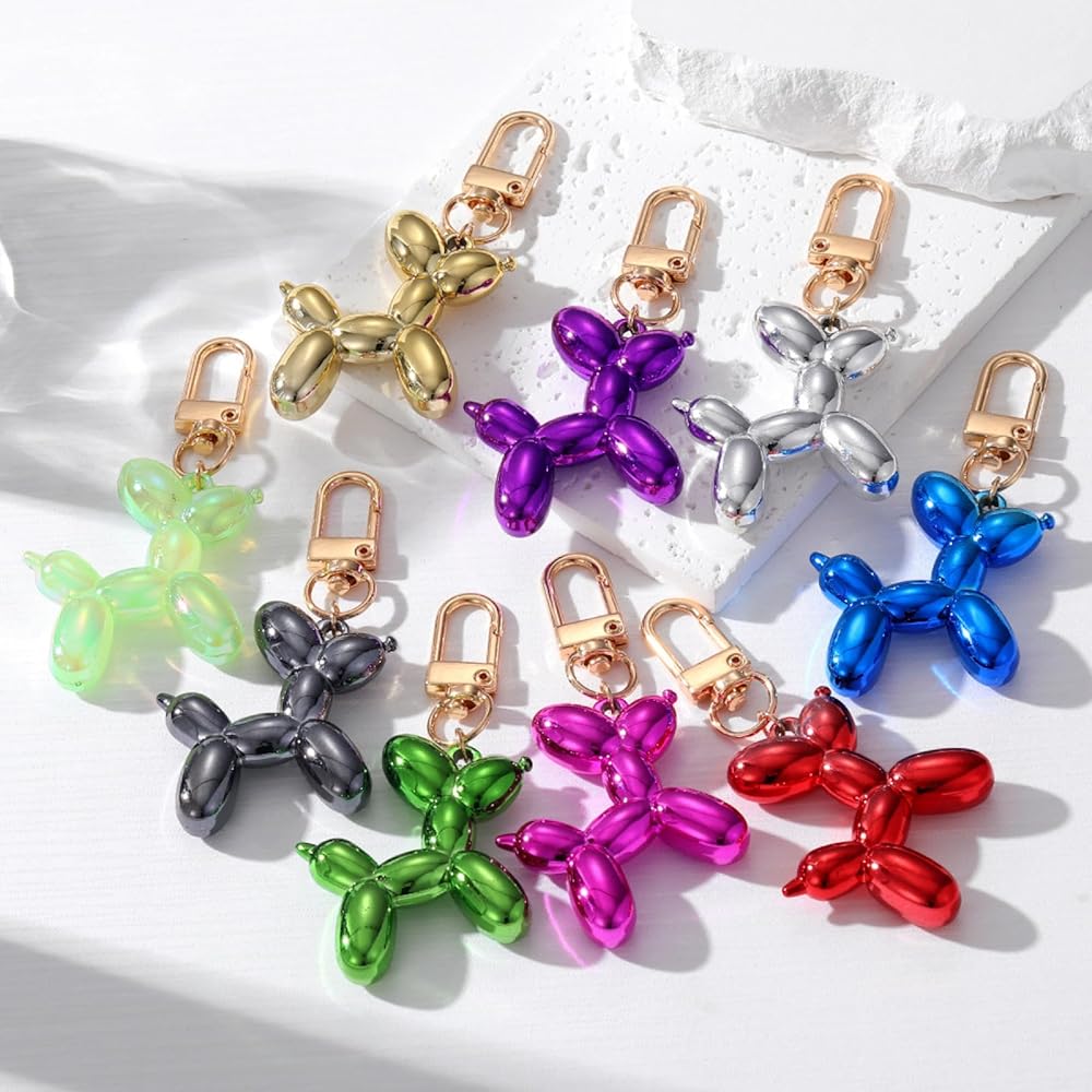 Balloon dog keychain assortment with metallic colors, each with a gold clasp and ring