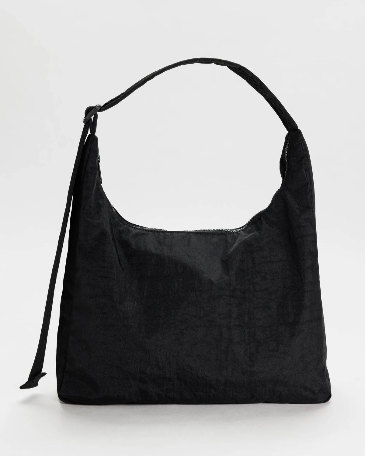 Black nylon shoulder bag with curved top handles and front pocket seam
