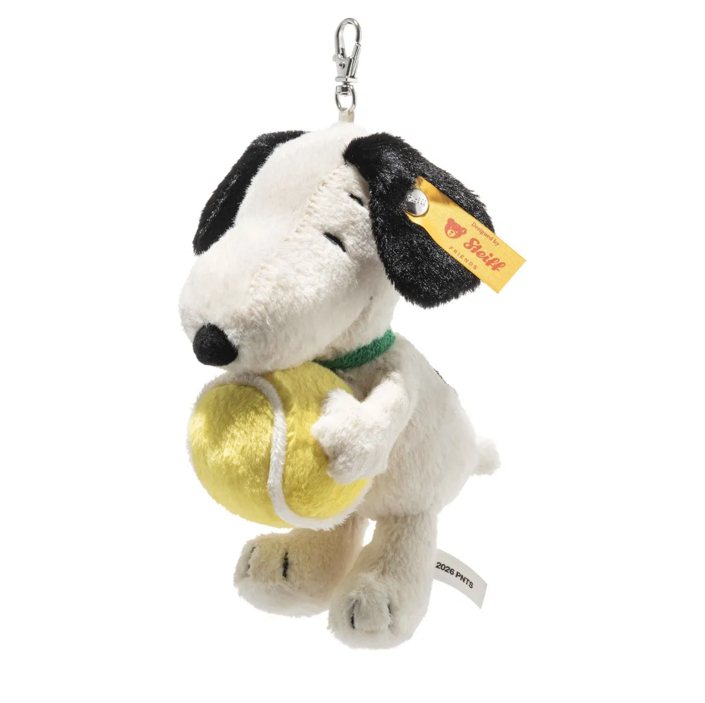 Plush Snoopy-style keyring with black-and-white dog, green collar, and tennis ball
