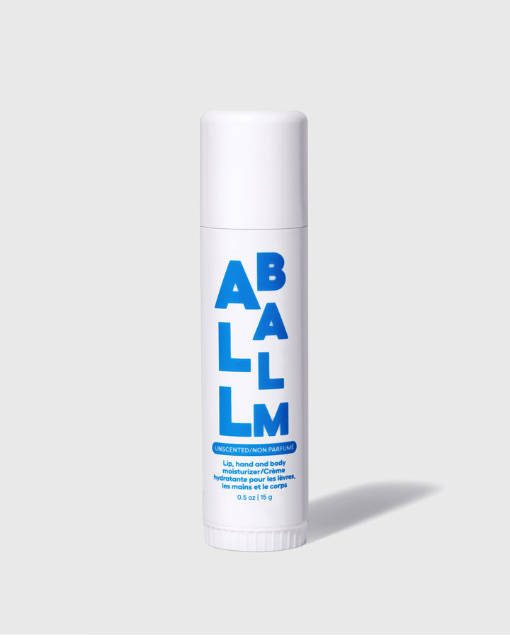 All balm stick with blue label on a white tube and a twist-up cap.