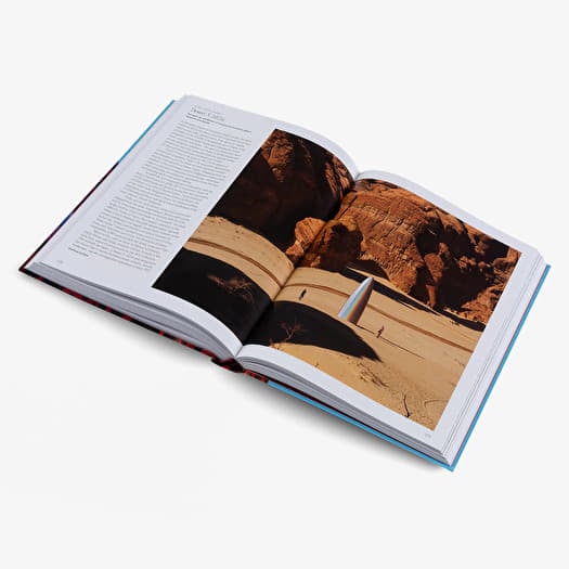 Open atlas book with photo spreads and text on visible pages