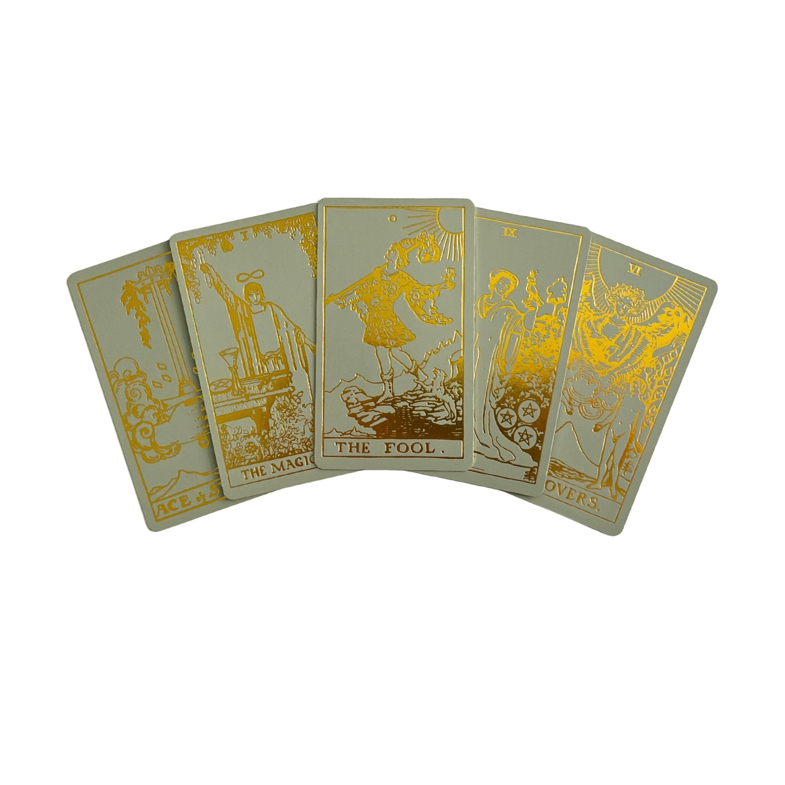 Tarot cards fanned out, each card showing gold-foil symbols and artwork