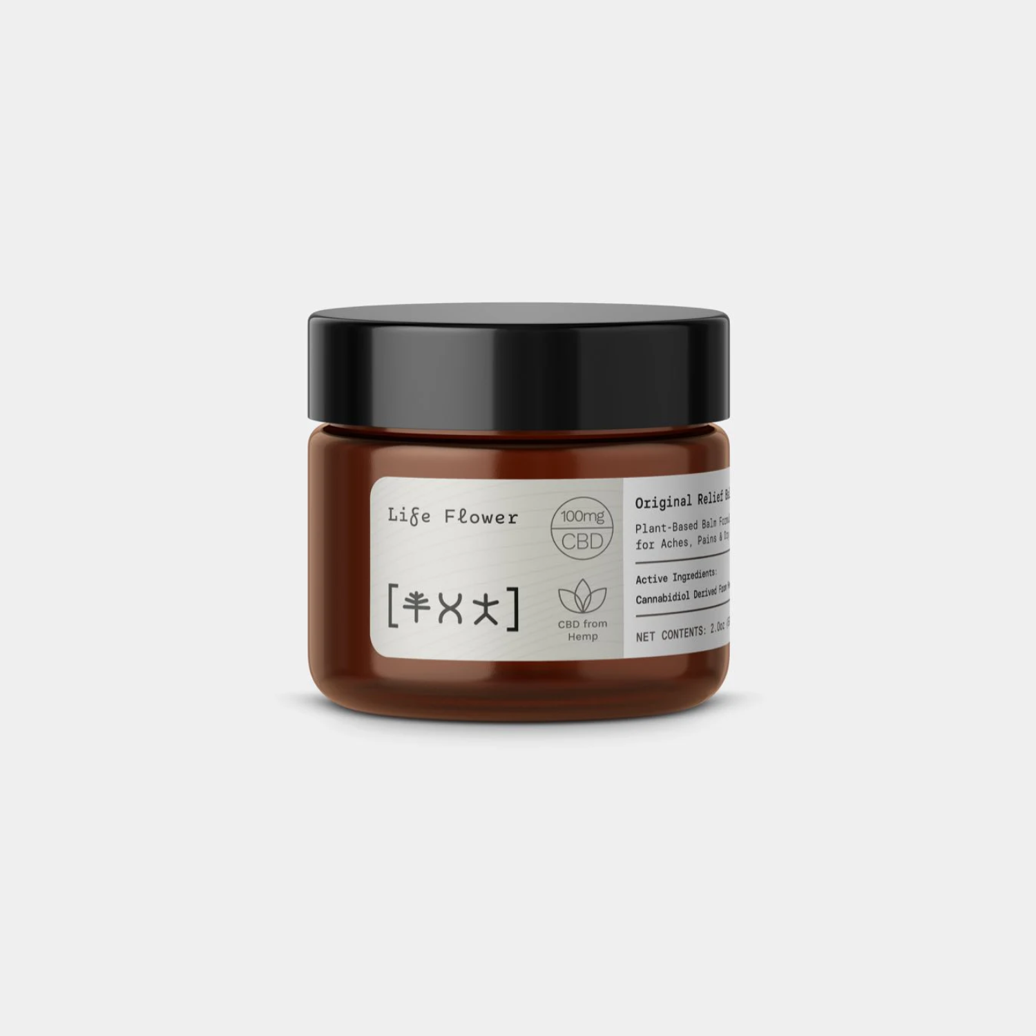 CBD relief balm jar with brown glass container and black screw-top lid