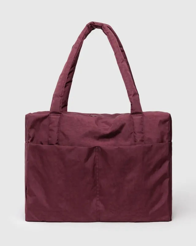 Carry-on travel bag in deep plum with short top handles and padded base.