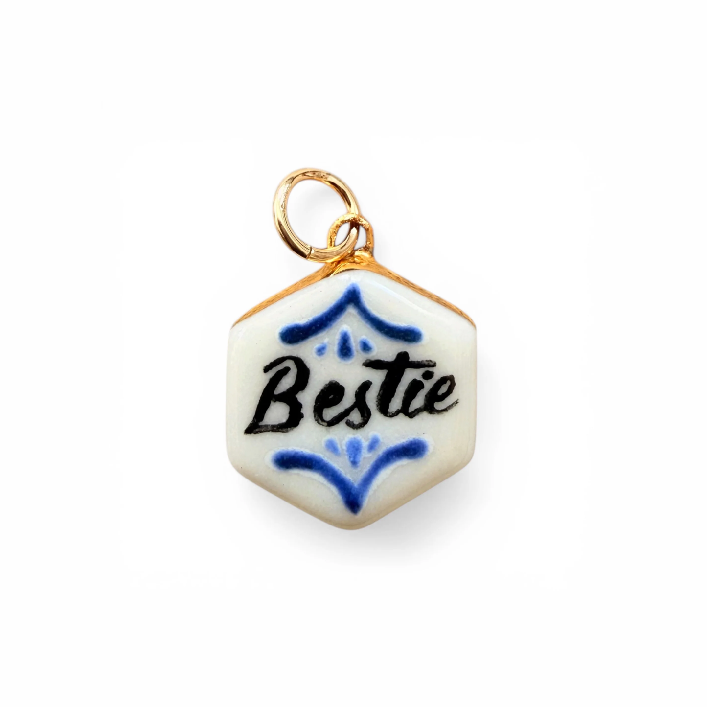 Porcelain hex charm with gold loop, blue accents, and 'Bestie' word