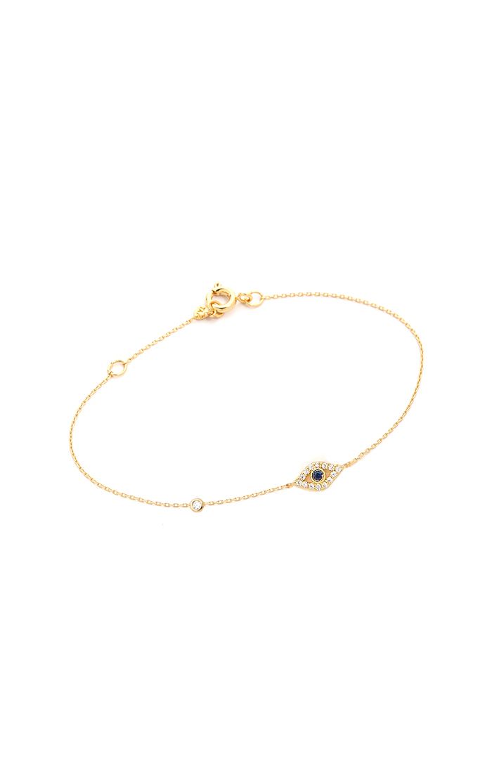 Gold chain bracelet with bow clasp and blue evil-eye charm