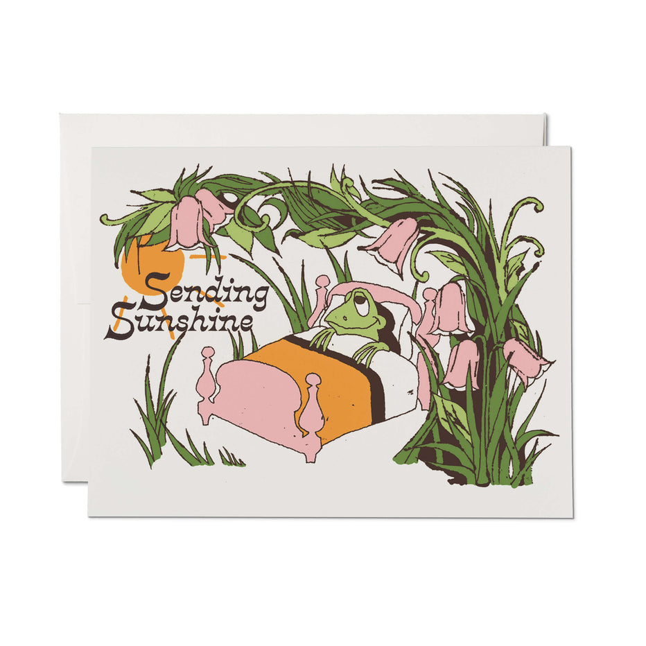 Encouragement card with green leaves, pink bunnies, and “Sending Sunshine” text on white