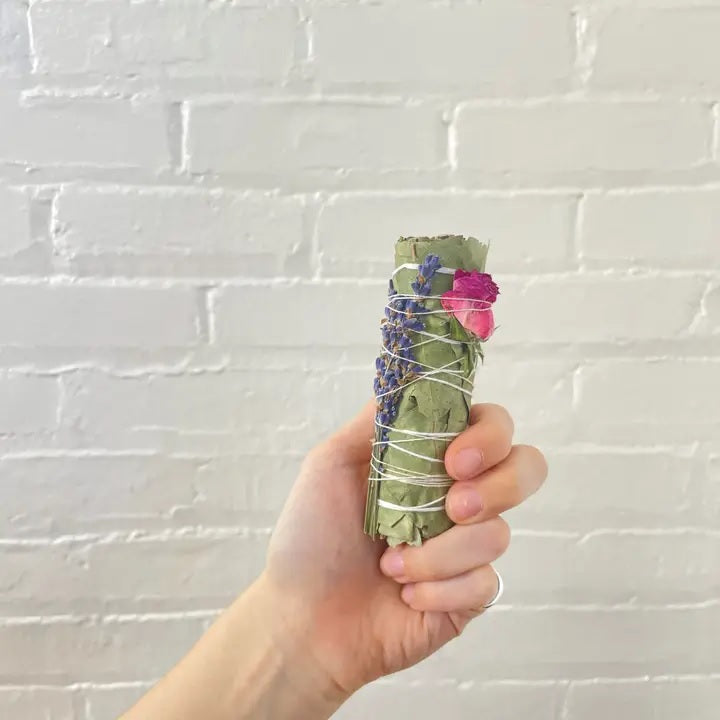 Small eucalyptus bundle with lavender sprigs and a pink rose bud