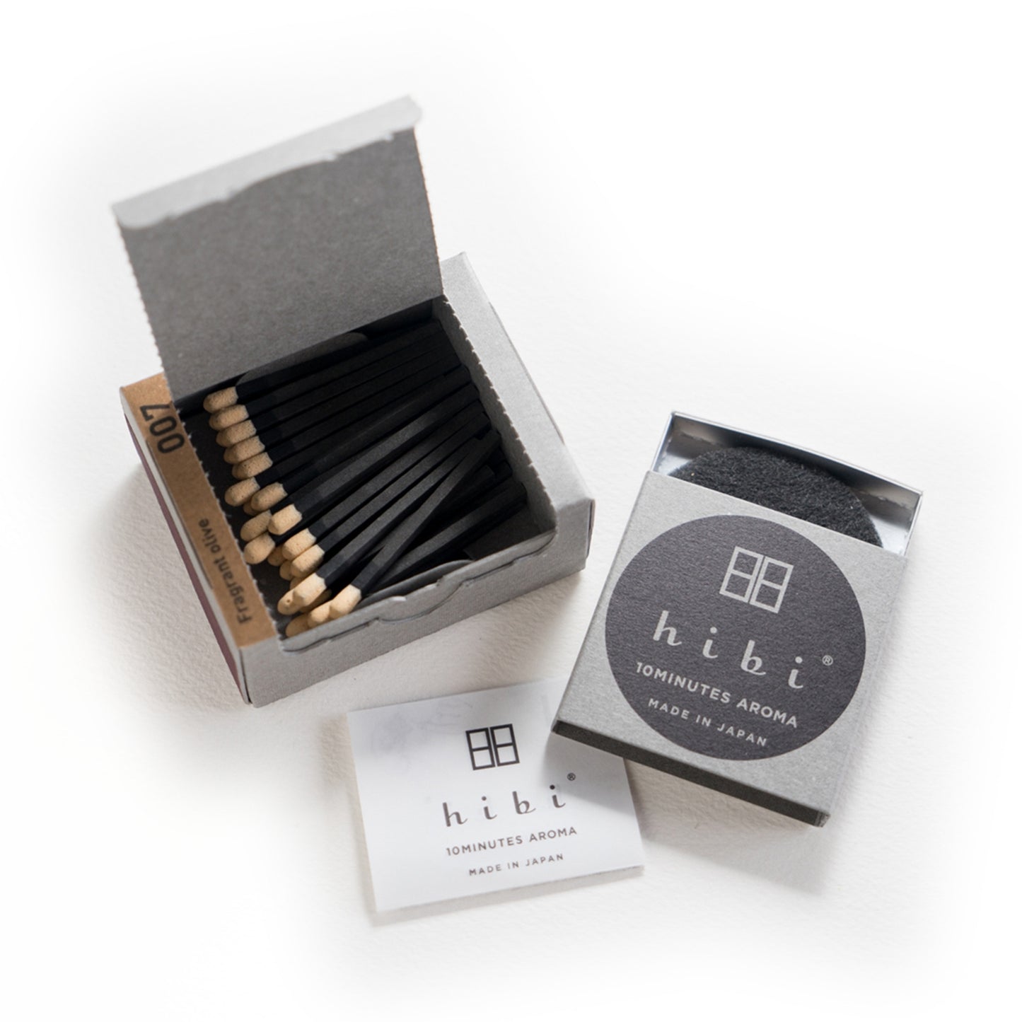 Hibi incense matches set: open box with dark match sticks and branded inner cards