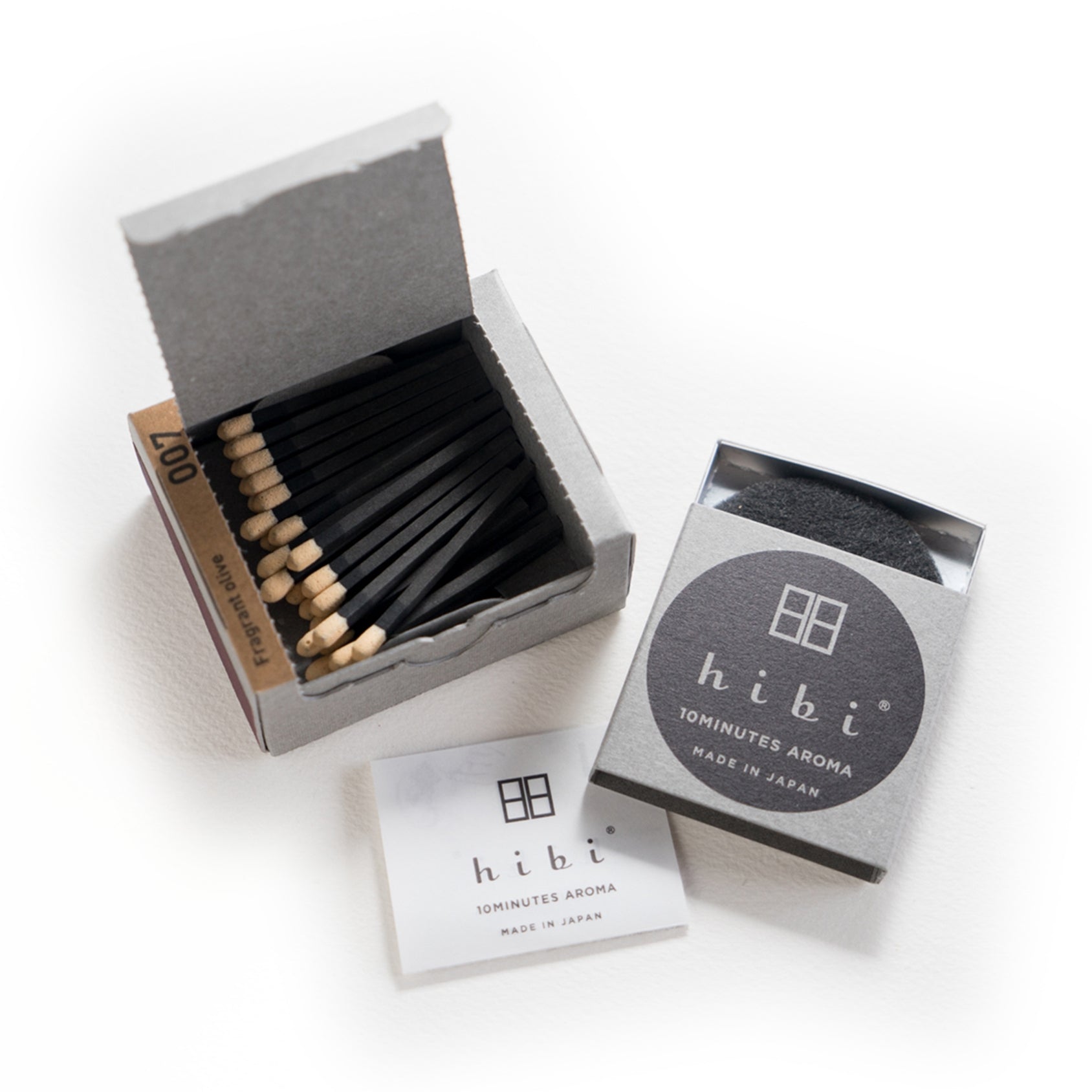 Hibi incense matches set: open box with dark match sticks and branded inner cards