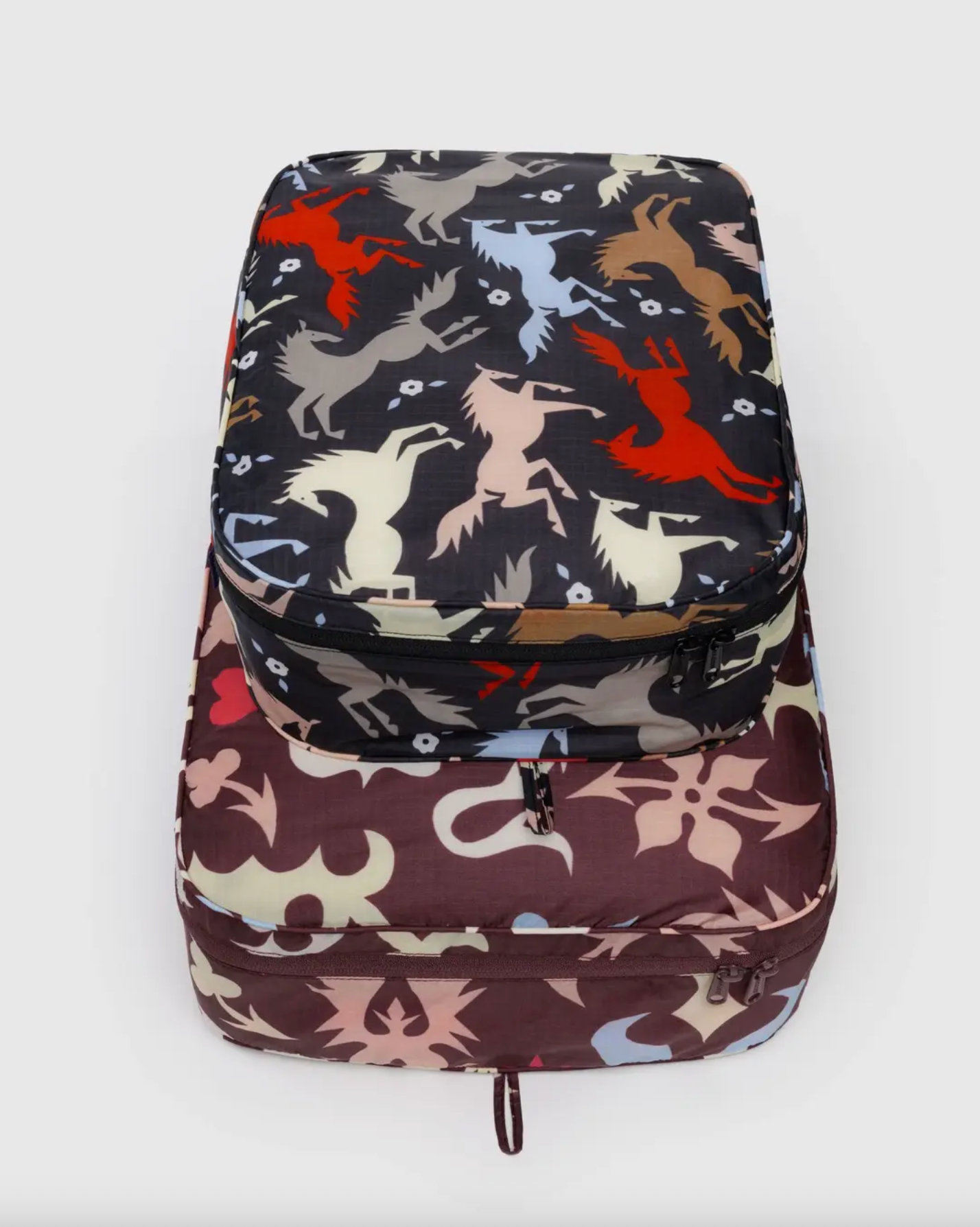 Large packing cube set with black and tan animal print and brown camo base, zipped