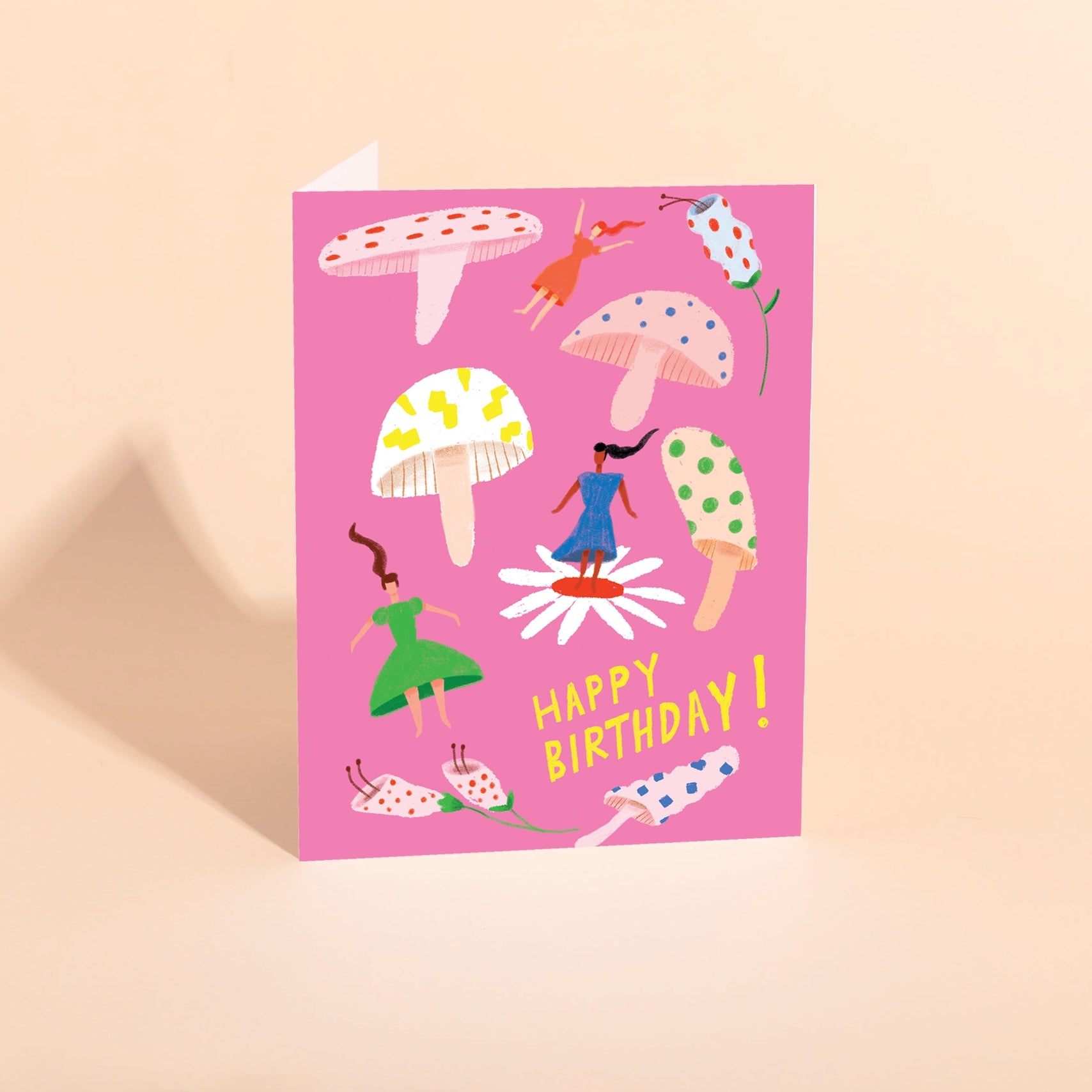 Birthday card with colorful mushroom illustration and "Happy Birthday!" text
