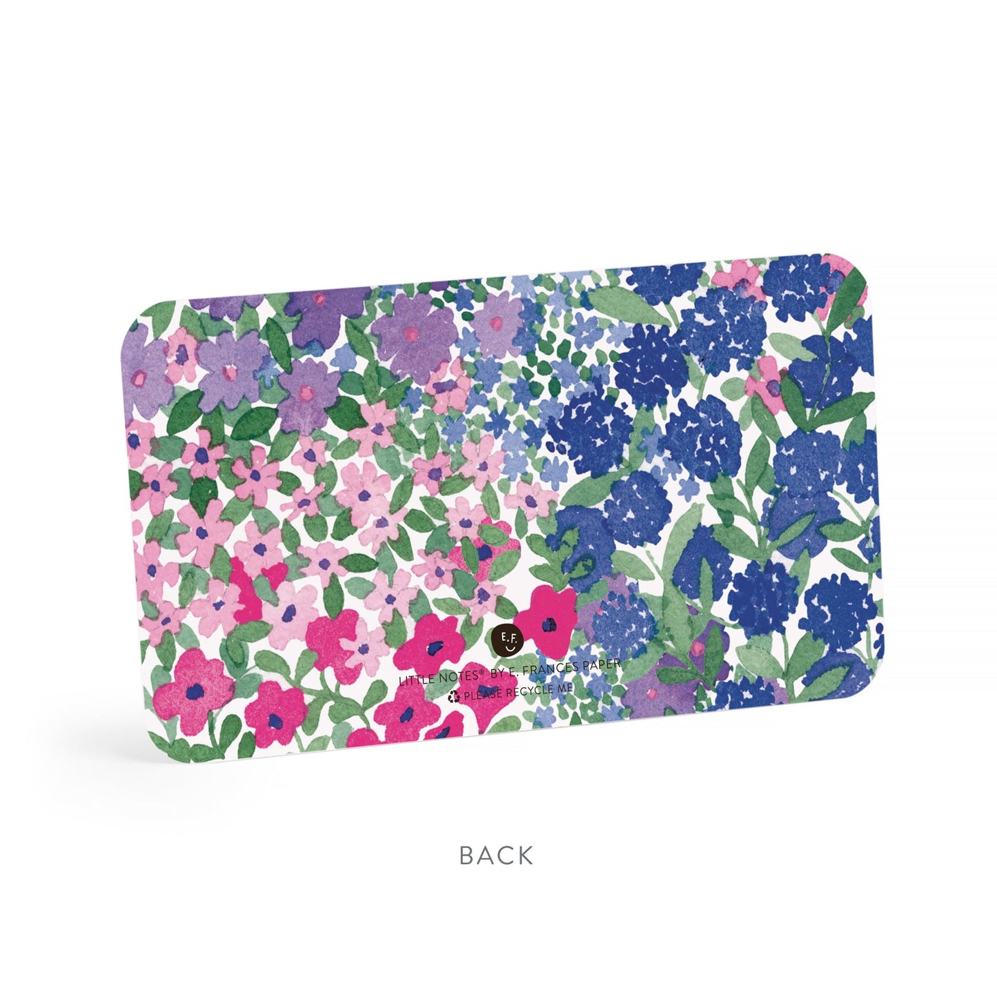 Floral patterned note card with multicolor flowers and leaves on one side