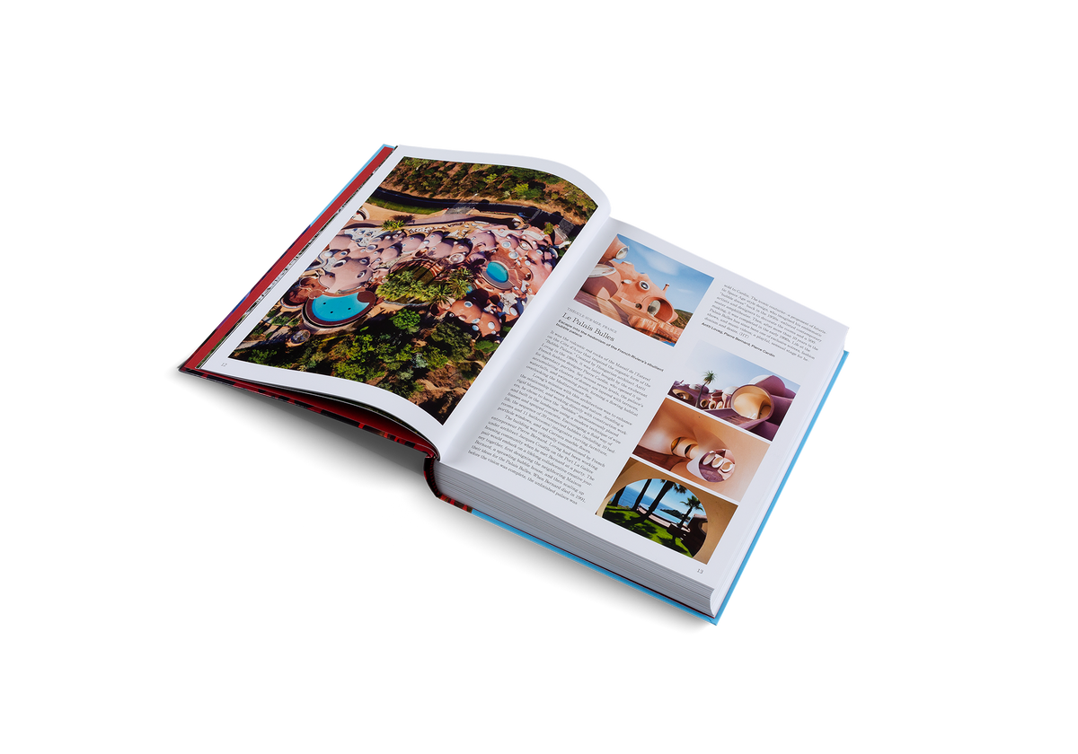 Open atlas book with color travel photos across two pages