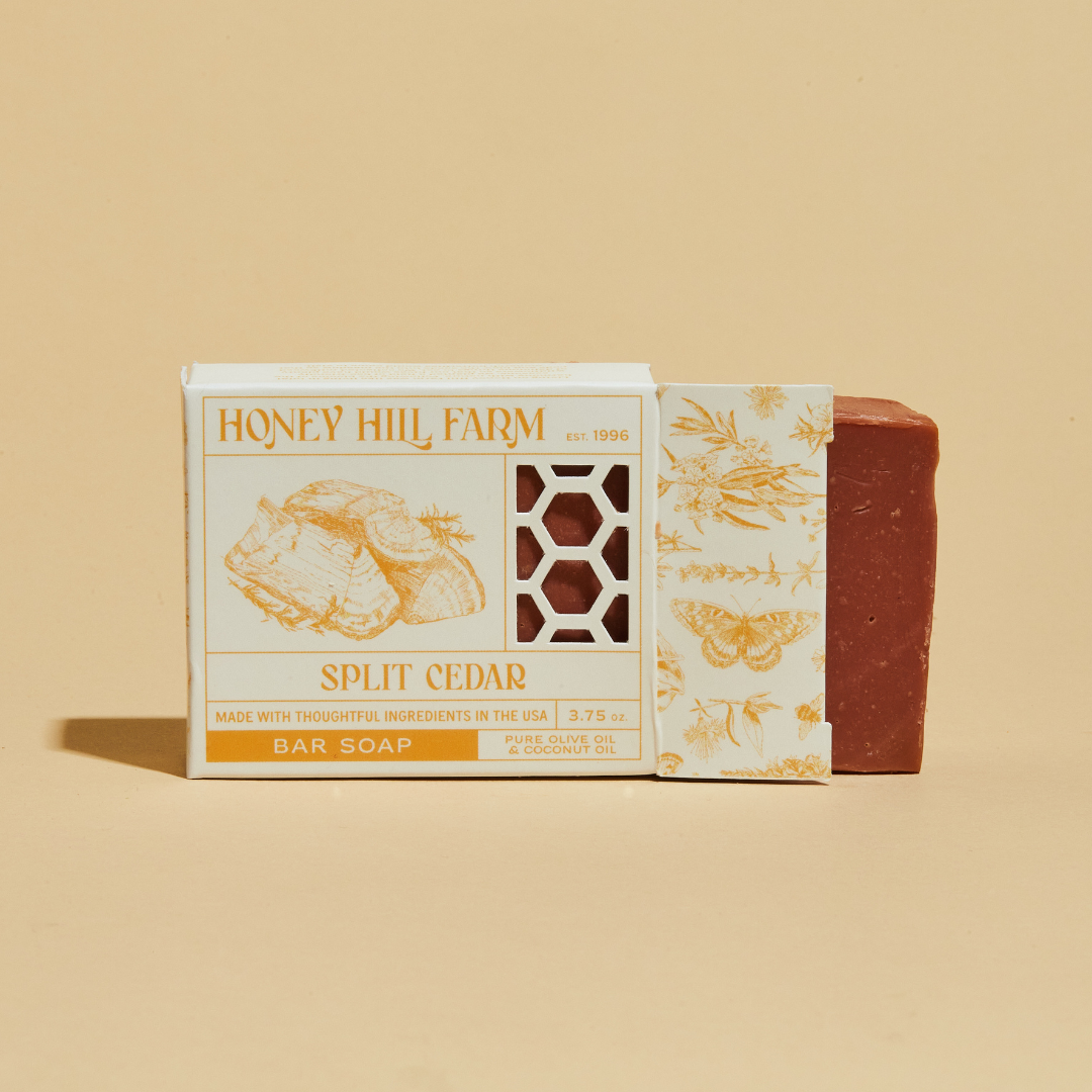 Honey Hill Farm Split Cedar bar soap with warm orange-brown bar and gold label box.