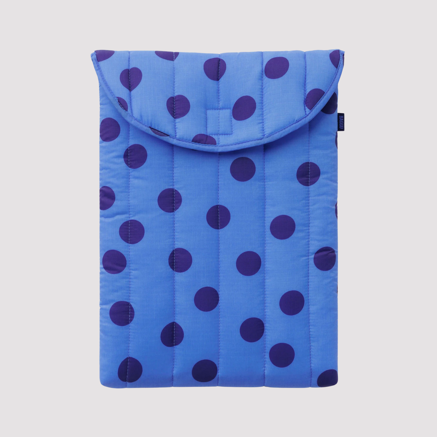 16-inch puffy laptop sleeve in blue with purple polka dots and flap